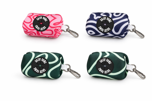 Four colourful key cases with 'Salty Paws' branding on a white background